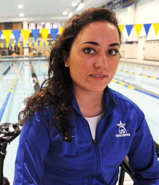 Kristin Duquette beside swimming pool