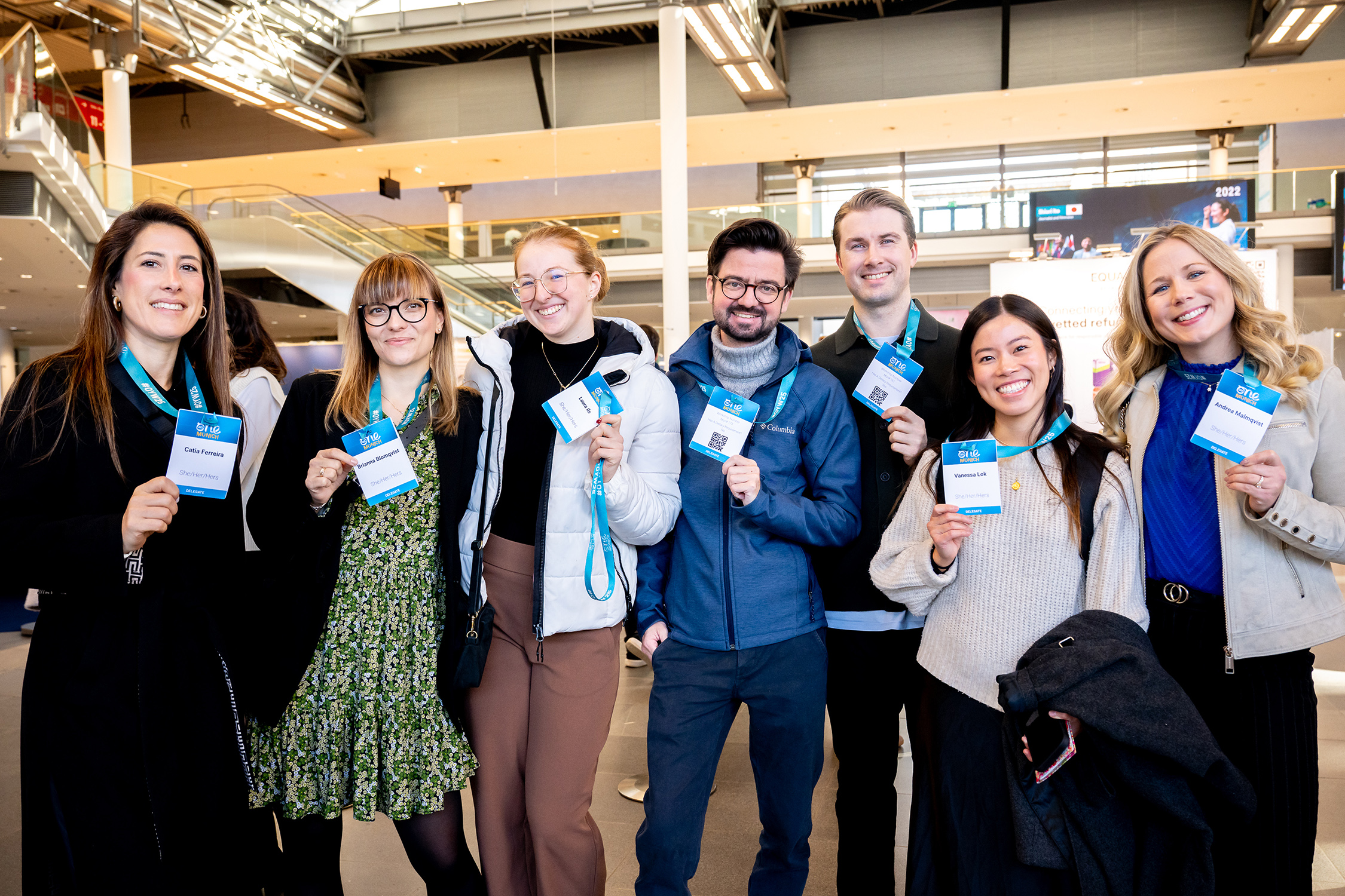 Delegates with badges - Munich 2025