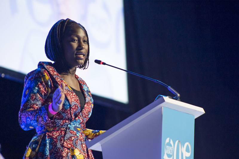 Kumba Musa talking at an OYW summit plenary