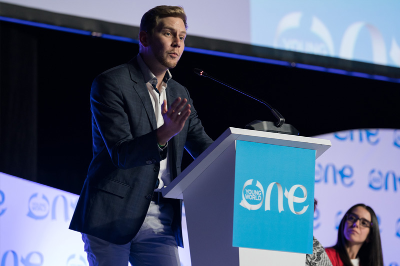 Marek Kubik talking at an OYW summit plenary