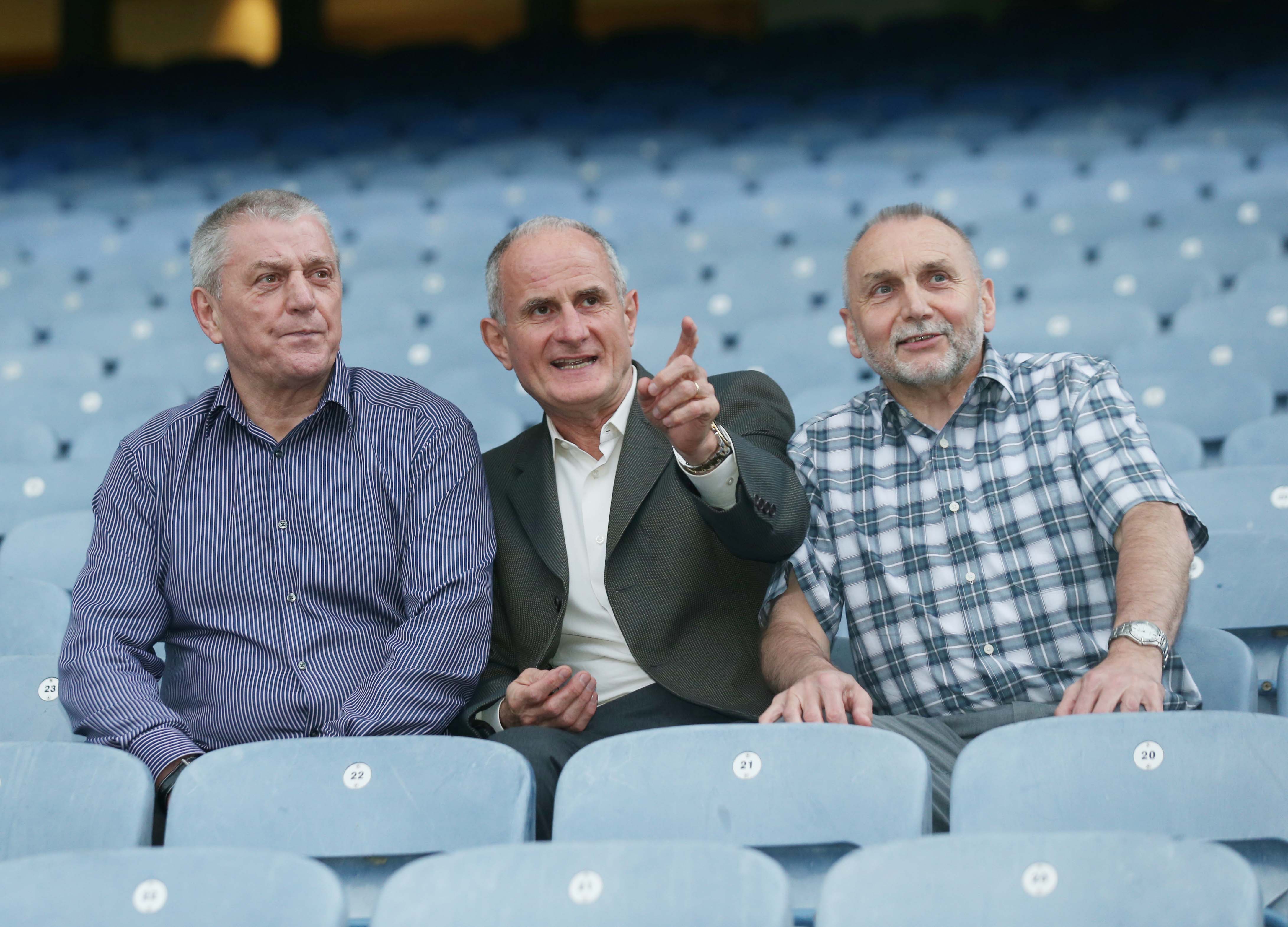 Dr Martin McAleese sitting between Sean and Jackie at Croke Park, Dublin