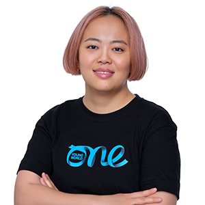 Portrait of Ikuyo Sakai wearing black tee shirt with One Young World Logo