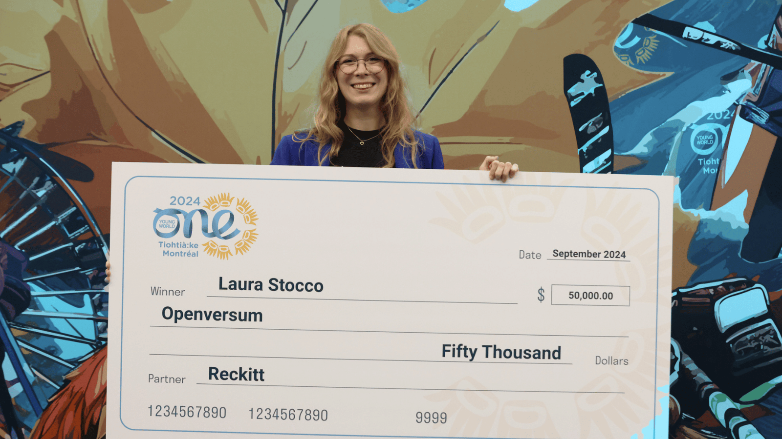 Laura Stocco receiving funding at 2024 Summit