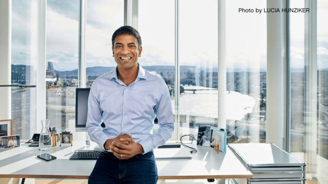 vasant narasimhan sitting on a desk