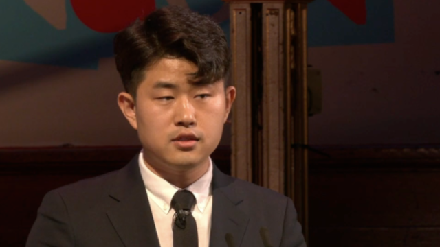 Kim GeumHyok speaking at One Young World Summit