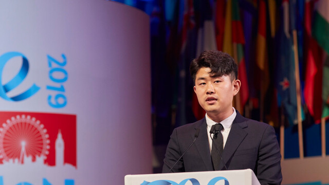 Kim GeumHyok speaking at One Young World Summit