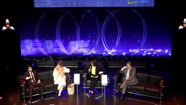 Ilia Calderón moderating a panel on the Audi stage with Luis Javier Castro, Mónica de Grieff, Federico Perez