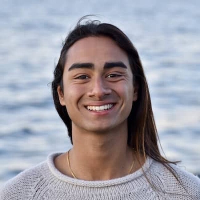 Bodhi Patil headshot photo against sea beach background