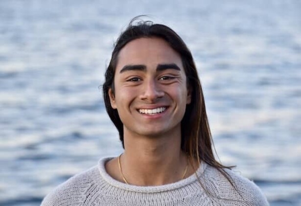 Bodhi Patil headshot photo against sea beach background