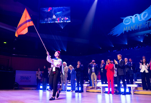 Refugee Nation Flag Bearer at Manchester Summit 2022