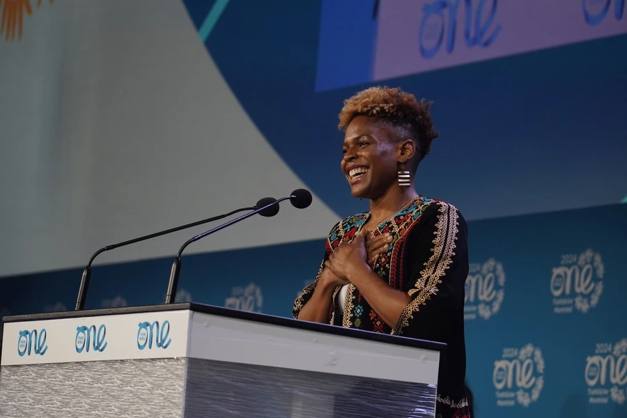 delegate at summit on stage