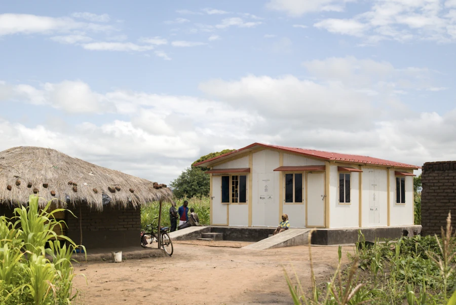 white house in village in malawi