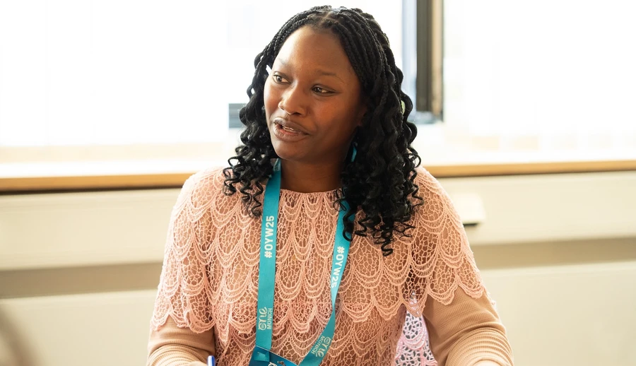 Delegate woman at the summit, in a workshop