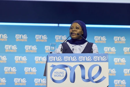 delegate at the summit on stage
