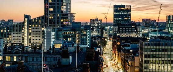 Cityscape of Manchester at dusk