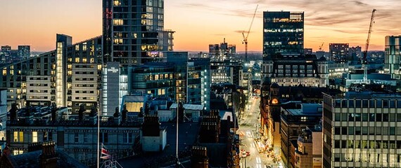 Cityscape of Manchester at dusk