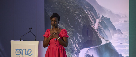 Crystal Asige presenting on the 'Empowering Progress / Audi Stage' at OYW Manchester Summit 2022