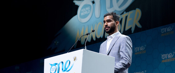 Raeed Ali giving a speech at the Summit