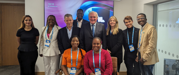 Group photograph of the OYW23 meeting between InterAction Council and One Young World Ambassadors, with Bertie Ahern and Juan Manuel Santos
