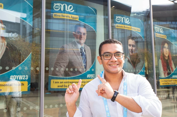 delegate in front of building