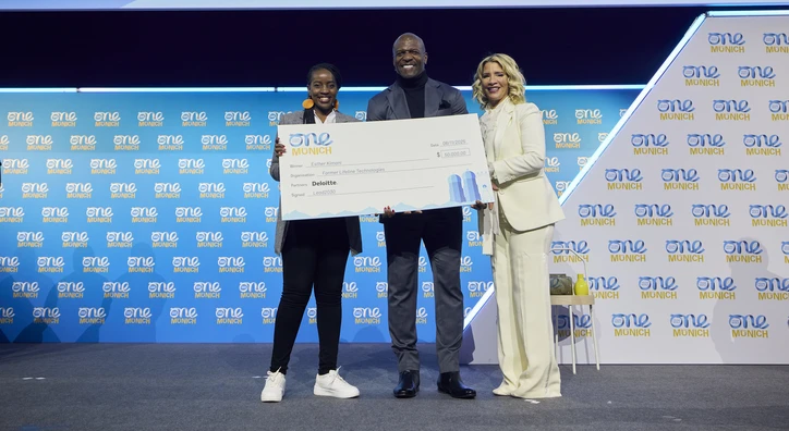 Cheque presentation at 2025 One Young World Summit