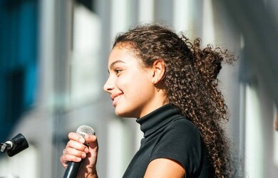 Lylou presenting at an event