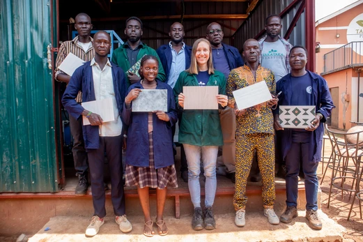 the engineering team at Takataka Plastics holding tiles