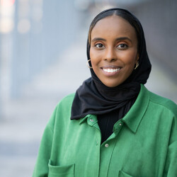 Portrait of Najma wearing green shirt