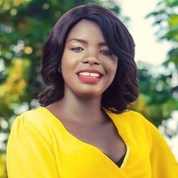 Portrait of Rebecca Aime in yellow dress