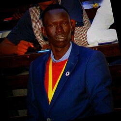 Taban Nuai Deng Wuor photo wearing blue blazer